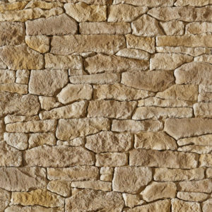 Mur en pierre de Causse Orsol sur treillis, teinte beige nuancé, conçu pour une installation rapide et esthétique.