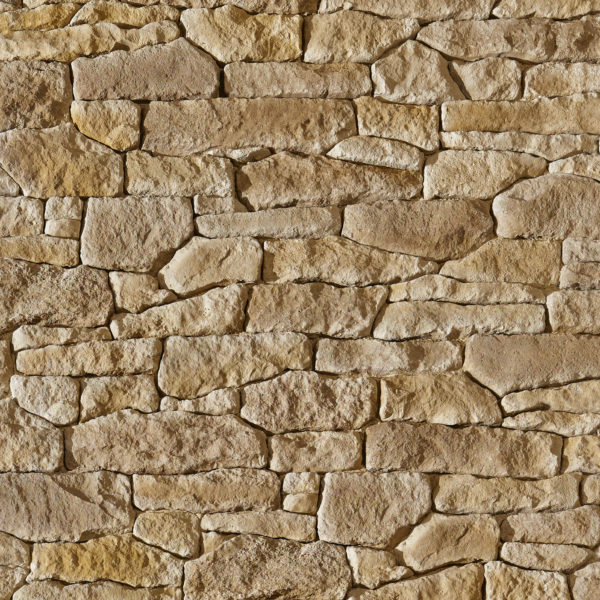 Mur en pierre de Causse Orsol sur treillis, teinte beige nuancé, conçu pour une installation rapide et esthétique.